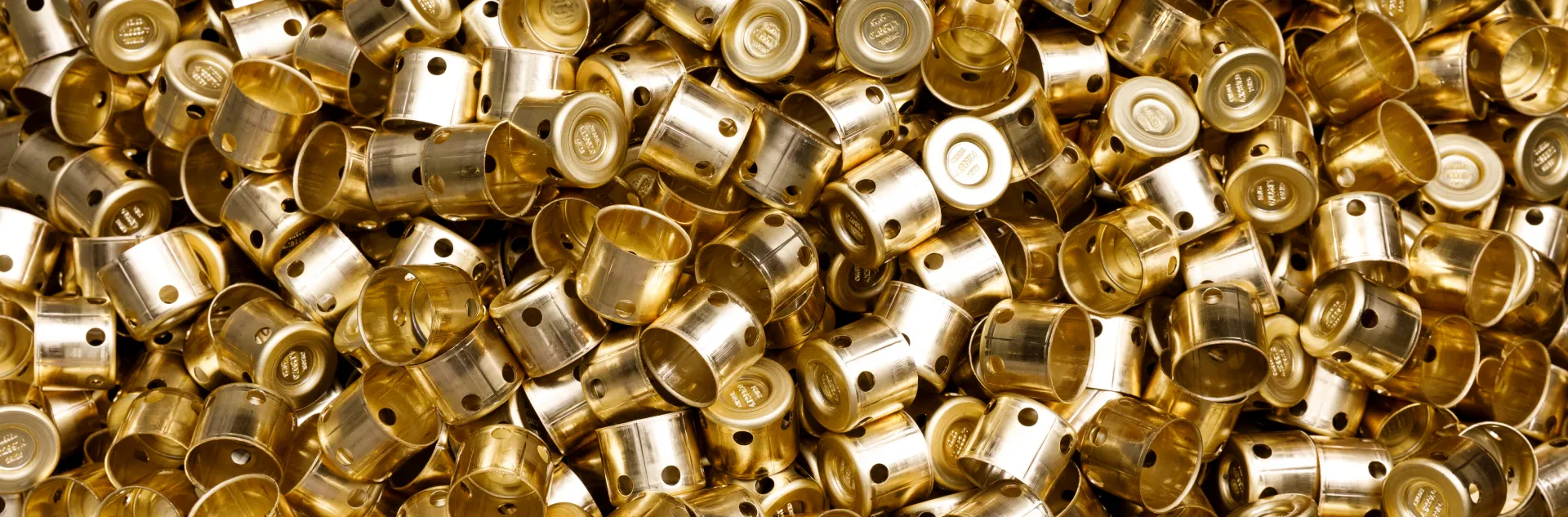 Deep-drawn brass cups with side holes